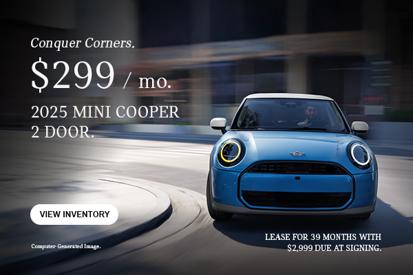 Front View of a Blue MINI Cooper curving around the corner.